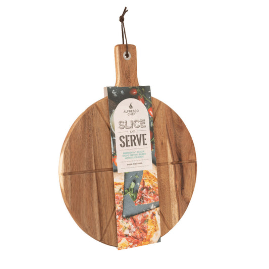 The 14" Acacia Wood Serving Board by Alfresco Chef is round and includes a handle adorned with a leather loop for hanging. It features a label that reads "Slice and Serve," along with an image of a pizza, and comes equipped with a handy slice guide to ensure perfect portions.