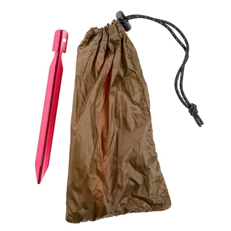 A red metal tent stake rests beside a brown drawstring pouch, made from durable nylon ripstop. The pouch, slightly wrinkled and secured with a black cord, is ideal for storing the stake or other equipment associated with the Amazonas Adventure Ultra-Light Tarp.