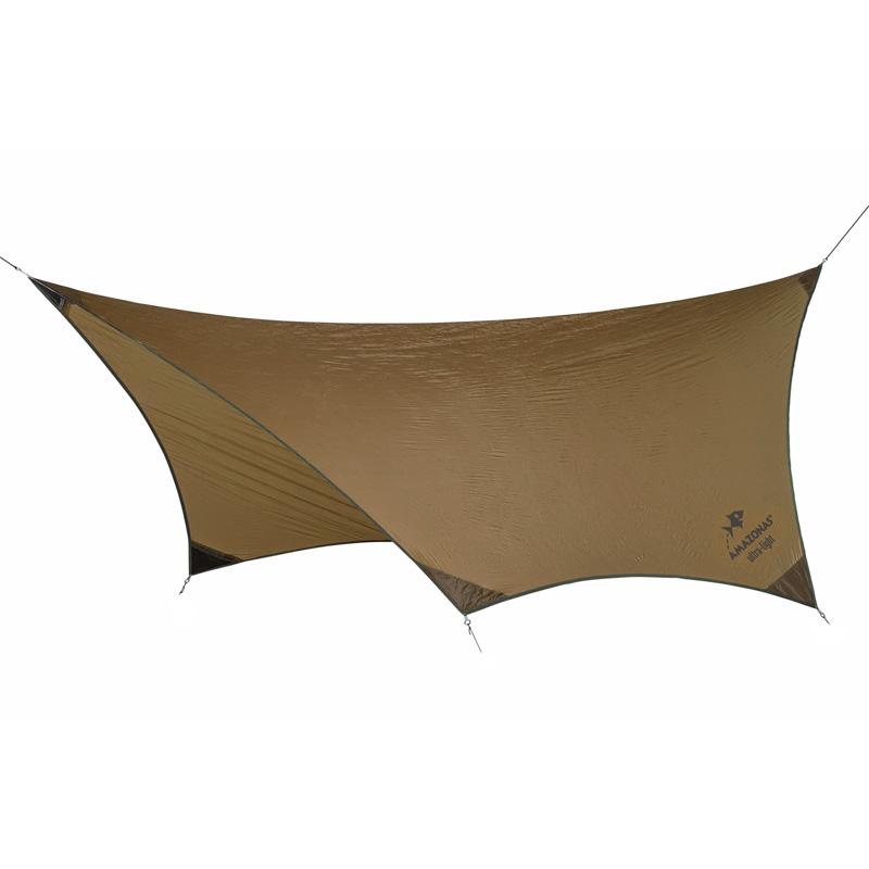 A large, rectangular brown Adventure Ultra-Light Tarp from Amazonas, made from durable Nylon Ripstop, is suspended with ropes at its corners. The tarp is taut and set up outdoors, providing a sheltered space underneath perfect for an ultra-light hammock setup.