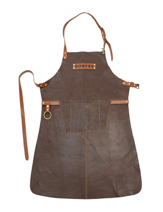 BonFeu Leather Apron-Bonfeu accessories-Bonfeu-Leather Apron The BonFeu leather apron, crafted from high-quality leather with logo detail and adjustable strap, is a stylish apron that offers heat protection and looks even better with age. It is made of thick leather for protection against the hot plate and splashes. It becomes even move beautiful when it is used. BonFeu Leather Apron specifications: Material: LeatherColor: BrownArticle Number: BABWeight: 890 gDimensions: L 44 x W 44 x H 2 cm-decor trading