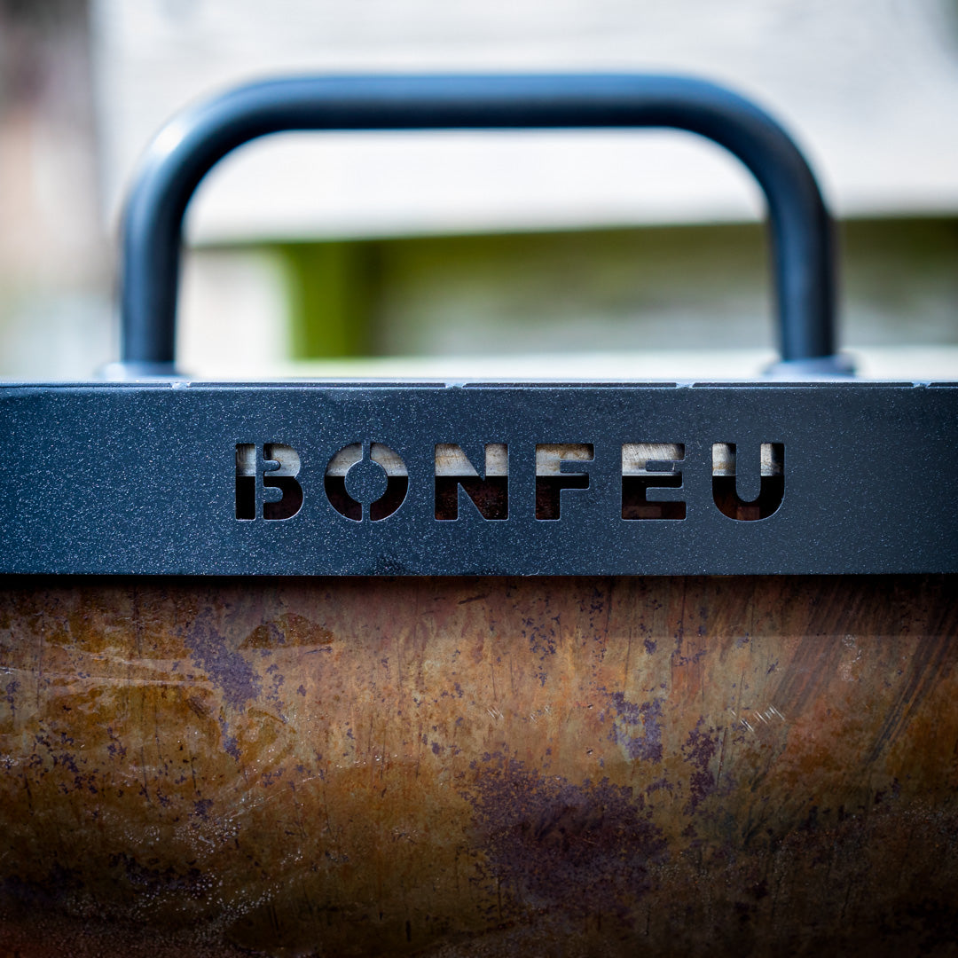 Bonfeu BonBiza Open.-Fire Bowl-Bonfeu-The BonBiza Open is an outdoor cooking instrument from BonFeu. It is like a large barbecue but for plancha baking. The BonBiza Open is one of our newer products and the showpiece of our entire collection. It is also by far the biggest product of the entire BonFeu collection. Unlike the regular BonBiza, the BonBiza Open has convenient wood storage in its base. So the BonBiza Open is the perfect piece to let you cook while enjoying a warm fire. The BonBiza Open Rust is ma