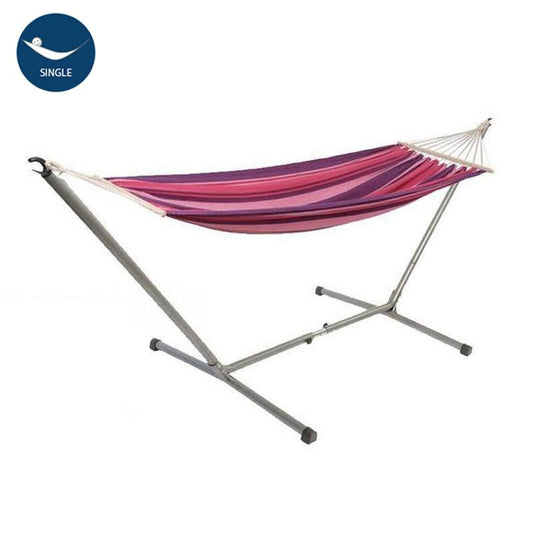 The Candy Garden Hammock Set by Amazonas features a vibrant striped hammock in hues of red, pink, and purple, elegantly suspended from a durable metal stand designed for easy assembly. With its ends slightly gathered, the comfortable hammock looks ready for immediate relaxation. A circular icon labeled "Single" clearly indicates its size.