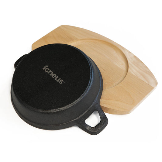 Igneus Pro Cast Iron Sizzler Pan-Pizza oven accessories-Igneus-ransform your wood-fired pizza oven into a powerhouse for cooking perfectly portioned meals. You can whip up delicious lasagna, cannelloni, and a variety of meats, fish, curries, and so much more! Simply place your ingredients in a cast iron sizzler pan, pop it into your pre-heated oven, and turn it occasionally until everything is cooked to perfection. Serve it up on a charming wooden serving board for a delightful presentation.The Igneus Sizzl