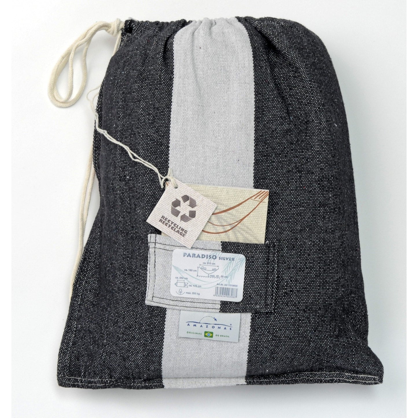 Crafted from Recycled Brazilian Cotton, this gray drawstring bag showcases a distinctive white vertical stripe and includes a tag with a recycling symbol. Designed for those who seek comfort, it features a label with text and displays a blue circular logo at the bottom, reflecting the style of Amazonas' Paradiso Silver Hammock.