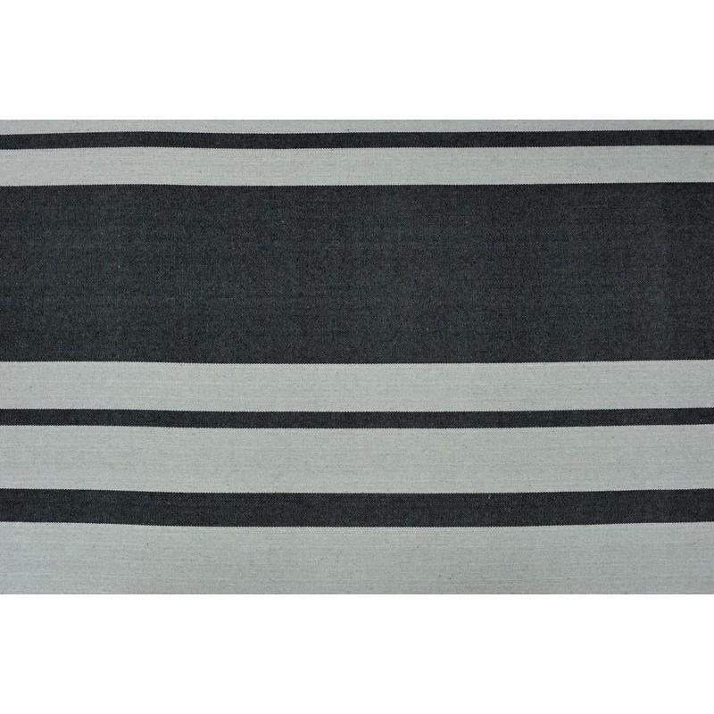 The Paradiso Silver Hammock by Amazonas is a rectangular textile made from recycled Brazilian cotton, showcasing a pattern of alternating horizontal black and gray stripes. Its bold yet simple design is ideal for those who seek both comfort and stylish relaxation.