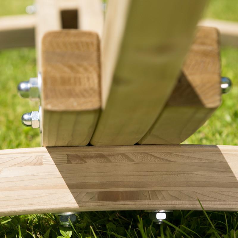 Close-up of the Santana Hammock Set by Amazonas, showcasing neatly aligned timber slats secured with metal bolts, reflecting Brazilian craftsmanship. Positioned on a grassy lawn, the wood boasts a smooth, natural finish that beautifully accentuates its grain.