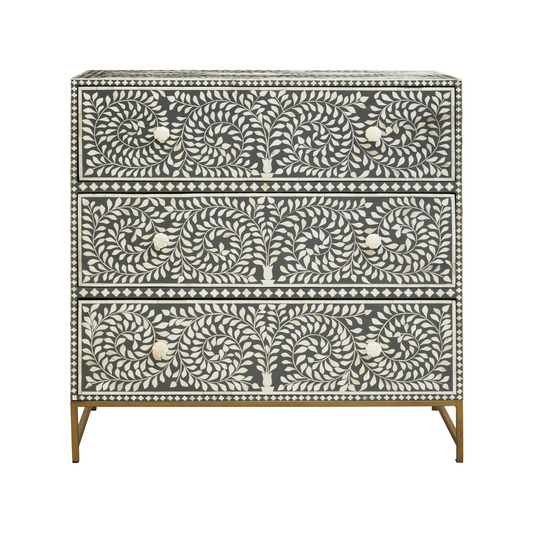 Serena three drawer chest-Chest of drawers-decor trading-This chest features beautifully hand inlaid white buffalo bone accents that form a delicate floral cutout design against the soft grey wood. With four spacious drawers providing plenty of storage, each one is adorned with a carved floral handle. The elegant gold-finished legs add a touch of luxury, making this accent piece a timeless addition to any space. Product dimensions: W 90 x H 100 x D 40 cm.-decor trading