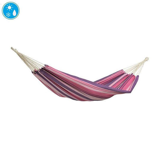 The Tahiti Candy Hammock, designed by Amazonas, displays bold pink, purple, and white stripes against a simple backdrop. In the top left corner, a snowflake and water drop icon emphasize its weather resistance thanks to Amazonas' specialized hammock fibers.