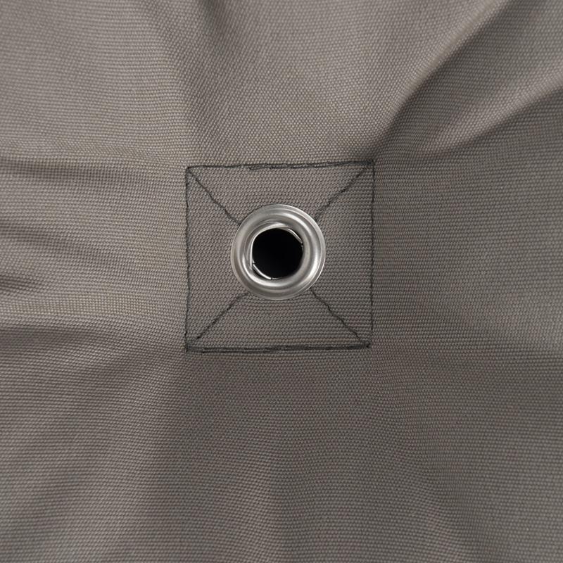 Close-up of the gray, water-repellent fabric from The Fat Hammock - Reversible by Amazonas, featuring a metal eyelet at the center surrounded by reinforced stitching in a square pattern. The fabric gently gathers around the eyelet to create subtle folds, making it ideal for luxury seekers who value both durability and style in their hammock quilt.