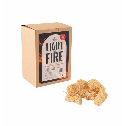 A brown box labeled Alfresco Chef features eco-friendly Wood Wool Firelighters made from natural wood wool. A few FSC Certified firelighter pieces are placed beside the box, which is decorated with images of flames.